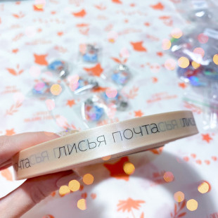 Упаковать в фирменную тишью с лентой